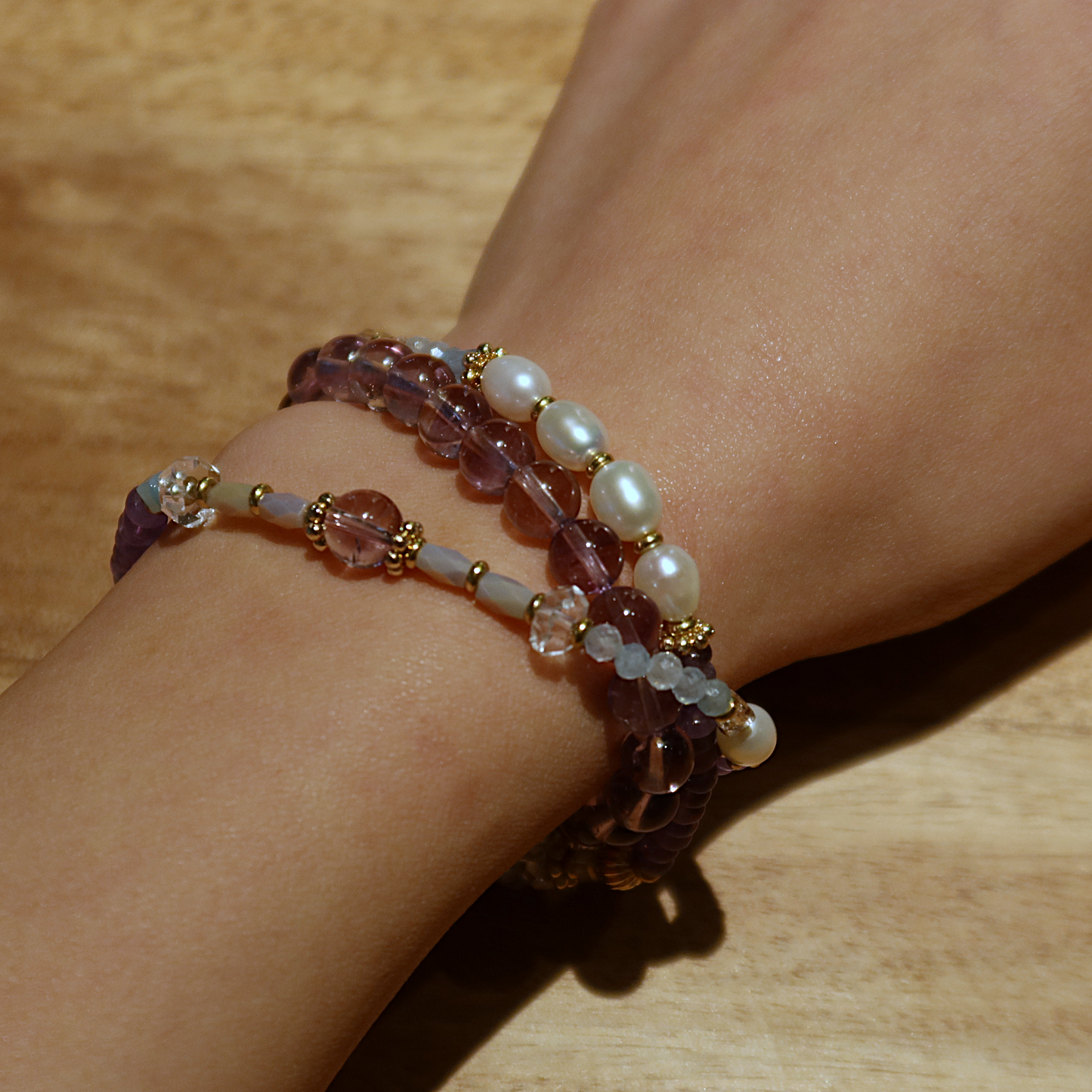 Model showcasing the Bohemian Beaded Amethyst Double Circle Bracelet, highlighting its harmonious blend of colors and textures