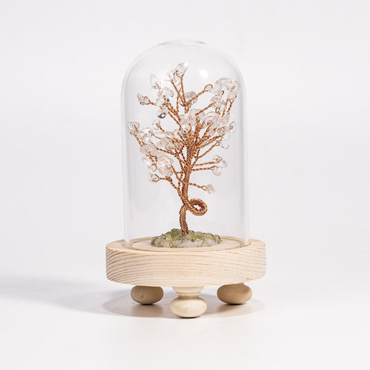 Handcrafted Crystal Tree showcasing clear Quartz crystals on intricate copper-wire branches, enclosed in a transparent glass dome and set on a wooden base